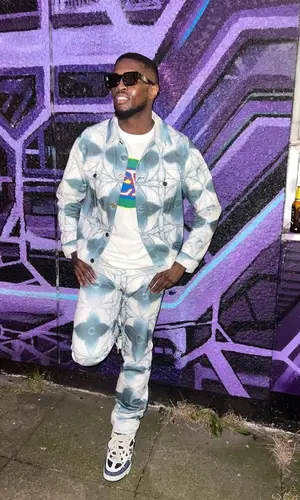 Swarmz wearing Louis Vuitton jacket