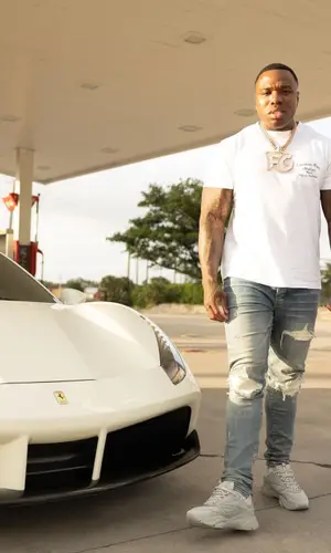BandMan Kevo wearing Amiri jeans