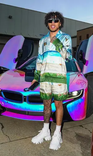 King Cid wearing Prada eyewear