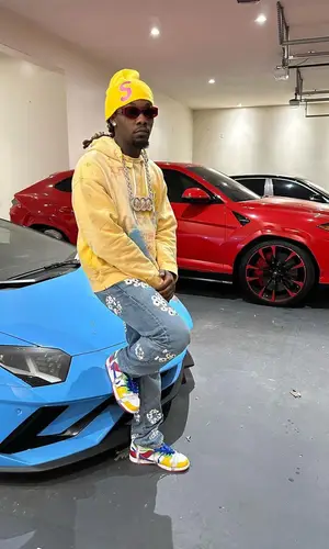 Offset wearing Supreme hat