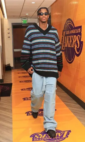 Jarred Vanderbilt’s Outfit in Off-White Jeans, Lanvin Sneakers & Balenciaga Eyewear (2023)