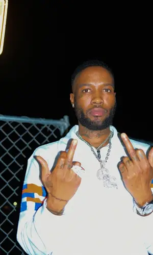 Shy Glizzy wearing Nike sneakers