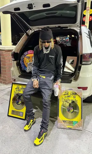 Lil Gnar wearing Prada belt