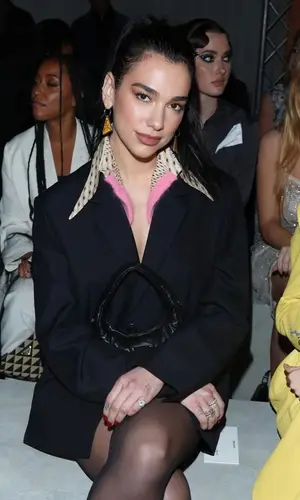 Dua Lipa wearing Prada boots