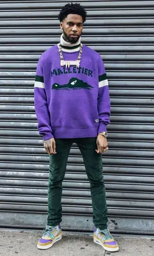 Key Glock wearing Louis Vuitton sweater