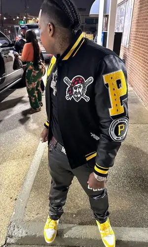 Finesse2tymes’ Outfit in Pro Standard Jacket, Louis Vuitton Sneakers & Moschino Belt (2023)