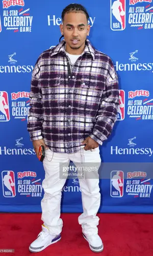 Ozuna wearing Amiri shirt