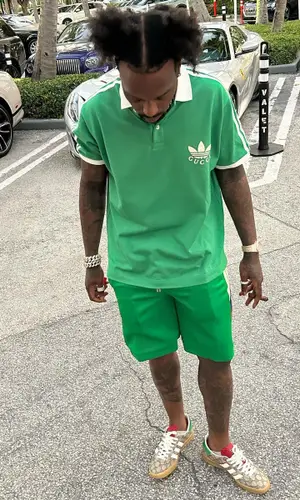 Sauce Walka wearing Gucci shirt