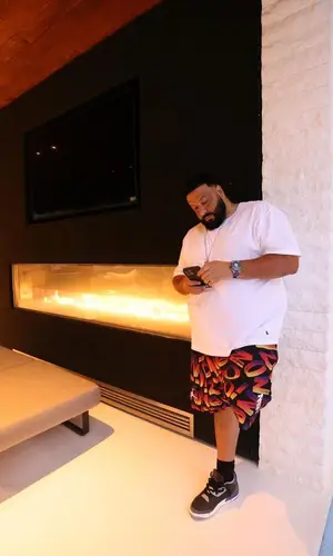 DJ Khaled wearing Polo Ralph Lauren t-shirt