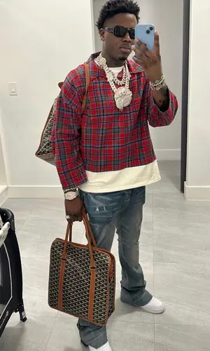 Real Boston Richey wearing Amiri jeans