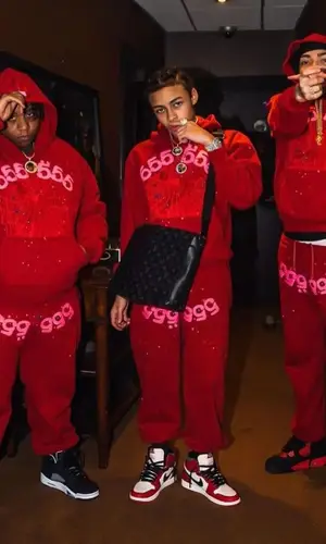 DD Osama wearing Spider Worldwide hoody