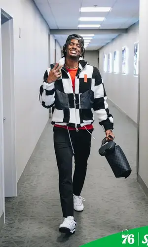 Tyrese Maxey wearing Mr. Saturday jacket