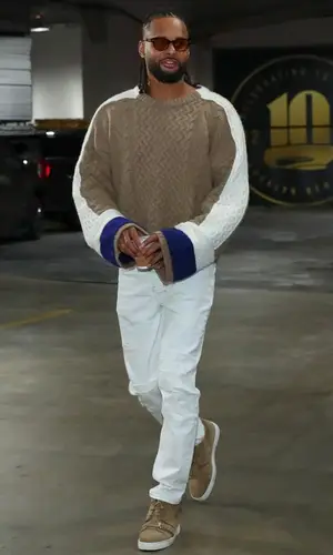 Patty Mills’ Outfit in Haider Ackermann Sweater, Ksubi Jeans & Christian Louboutin Sneakers (2023)