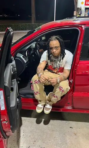 Trippie Redd’s Outfit in Chrome Hearts Jeans, Cartier Eyewear & Matty Boy (2023)