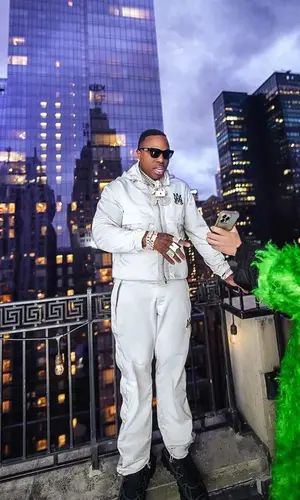 BandMan Kevo wearing Amiri pants