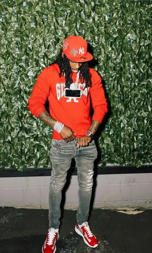 Polo G wearing Givenchy sweater