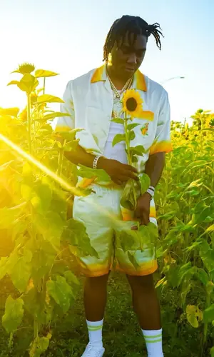 Fredo Bang wearing Casablanca shorts