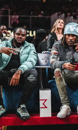 Tee Grizzley wearing Dior jacket