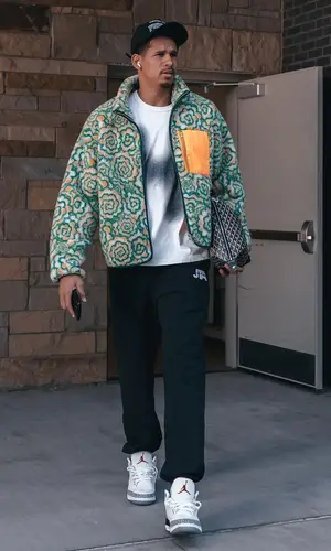 Juan Toscano-Anderson’s Outfit in Sundae School Jacket, Jordan Sneakers & Goyard Bag (2023)