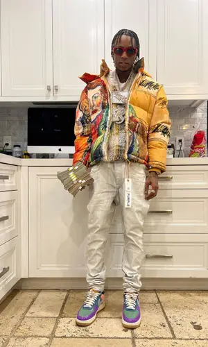 Soulja Boy’s Outfit in KidSuper Jacket, Purple Brand Jeans & Versace Eyewear (2023)