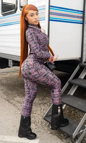 Ice Spice’s Outfit in Chanel Top & Givenchy Boots (2023)