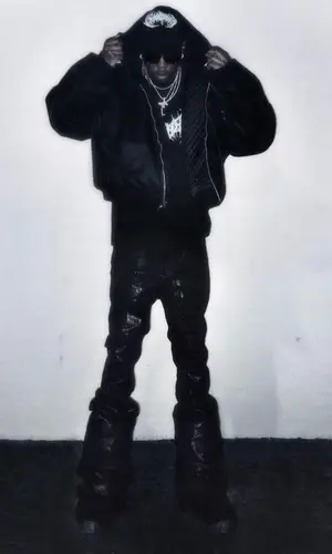 Destroy Lonely’s Outfit in Playboi Carti Merch Jacket, Rick Owens Jeans & Chrome Hearts Eyewear (2023)