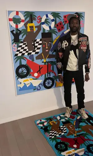 Meek Mill wearing Pelle Pelle jacket