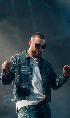 Travis Kelce wearing Louis Vuitton eyewear