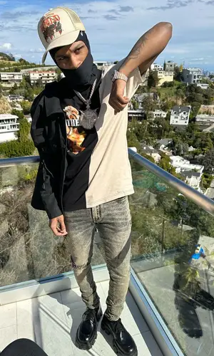 Toosii wearing Nike other