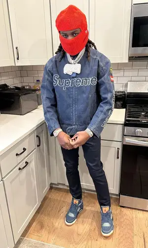 SleazyWorld Go wearing Supreme jacket