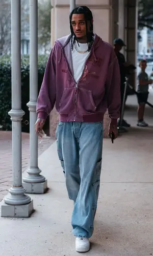 Jordan Clarkson’s Outfit in Supreme Hoodie, Evisu Jeans & True Religion (2023)