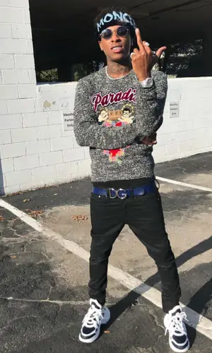 NBA YoungBoy wearing Moncler hat