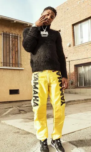 NBA YoungBoy wearing Saint Laurent sweater
