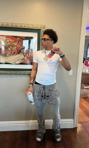 K Suave wearing Hanes t-shirt