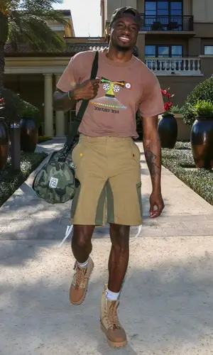 Thanasis Antetokounmpo’s Outfit in Vintage T-Shirt, Round Two Shorts & From a Penny Cap (2023)