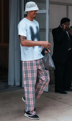 Juan Toscano-Anderson’s Outfit in Helmut Lang T-Shirt, Supreme Jeans & Prada Hat (2023)
