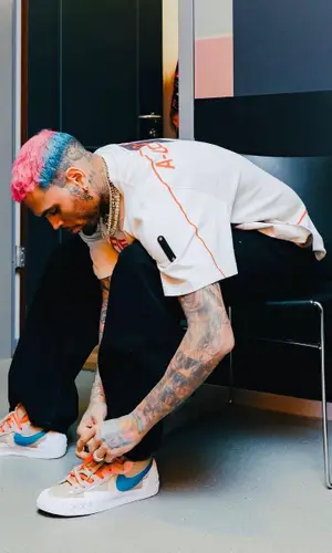 Chris Brown wearing Avenue C sweater