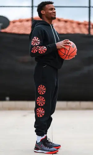 Bronny James wearing Nike pants
