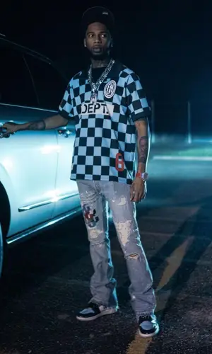 Key Glock wearing New Era cap