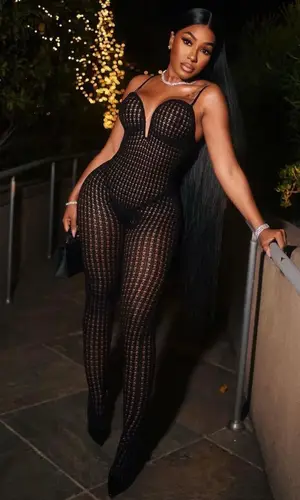 Yung Miami’s Outfit in Alaïa Suit, Hermes Bag & Christian Louboutin Sandals (2023)