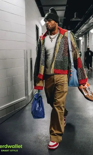 PJ Tucker wearing Goyard backpack