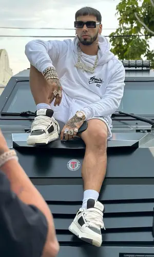 Anuel AA wearing Amiri hoody