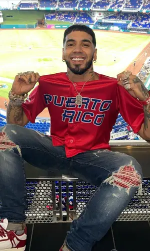 Anuel AA wearing Amiri jeans