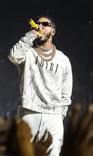 Anuel AA wearing Amiri pants