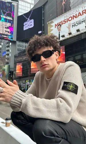 Bankrol Hayden’s Outfit in Stone Island Sweater, Rick Owens Jeans & Prada Eyewear (2023)