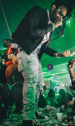 Peezy wearing Bottega Veneta belt