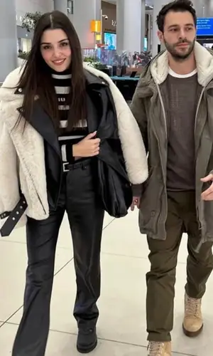 Hande Erchel’s Outfit in The Kooples Jacket, Miu Miu Sweater & Prada Belt (2023)