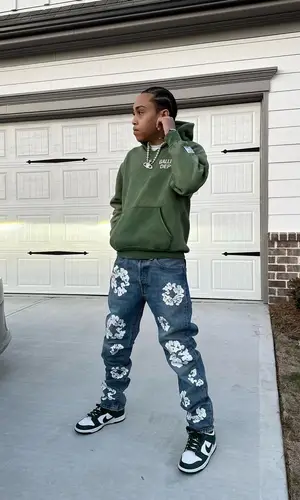 Stunna Gambino’s Outfit in Gallery Dept. Hoodie, Denim Tears Jeans & Vivienne Westwood Jewelry (2023)