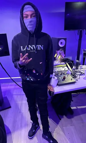 SL wearing Amiri jeans