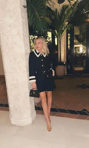 Morgan Stewart wearing Gucci shorts